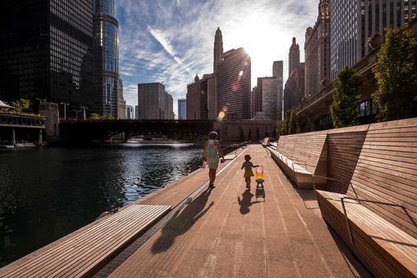 Mother and child walking on Chicago riverwalk