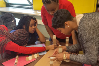 Engineers working with the STEM Program at high school